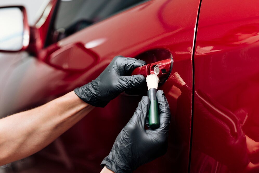 close up person cleaning car exterior_23 2148194136